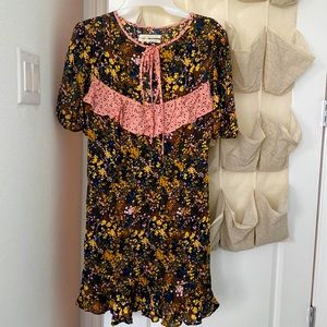 URBAN OUTFITTERS beautiful double lined mini dress with puff sleeves , size M